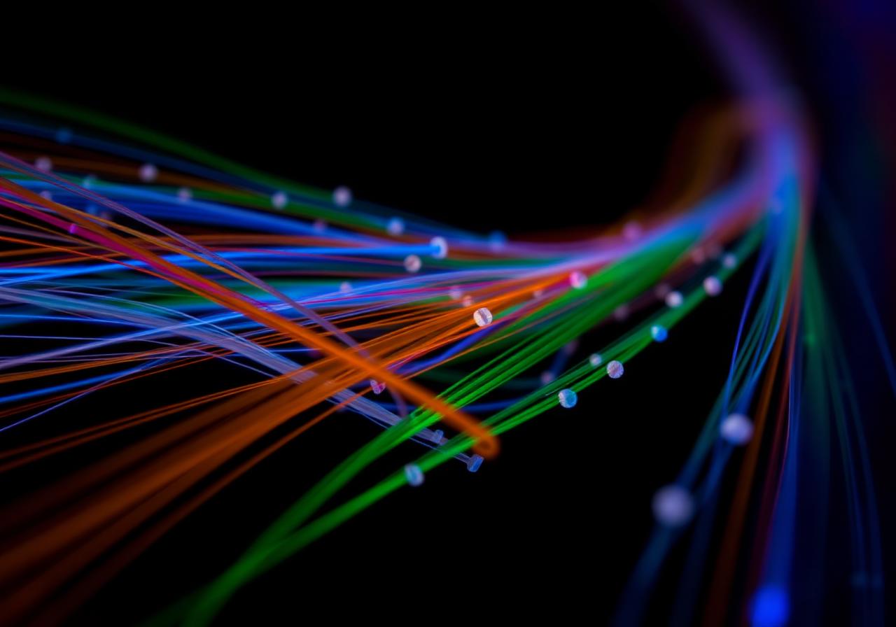 Color-coded fiber optic strands carrying light, a quick reference for fiber optic education